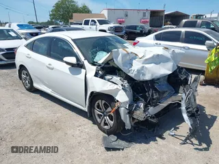 2017 Honda Civic LX z VIN 19XFC2F52HE012900, wystawiony jako IAAI lot #41905114 z przebiegiem 150 045 mil mil oraz . Historia ofert i sprzedaży dostępna na DreamBid. Obrazek 1.