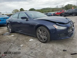 2018 Maserati Ghibli z VIN ZAM57XSA5J1287424, wystawiony jako Copart lot #71215154 z przebiegiem 20 029 mil mil oraz Szkoda całkowita • Salvage title. Historia ofert i sprzedaży dostępna na DreamBid. Obrazek 4.