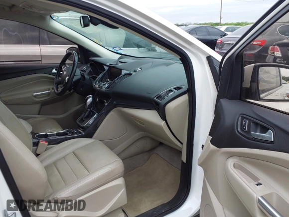 2014 Ford Escape Titanium with VIN 1FMCU0JX7EUB00220, listed as a IAAI auction lot 41945725 with 162,385 mi miles. Bid and sale history available at carsss.com. Image 5.