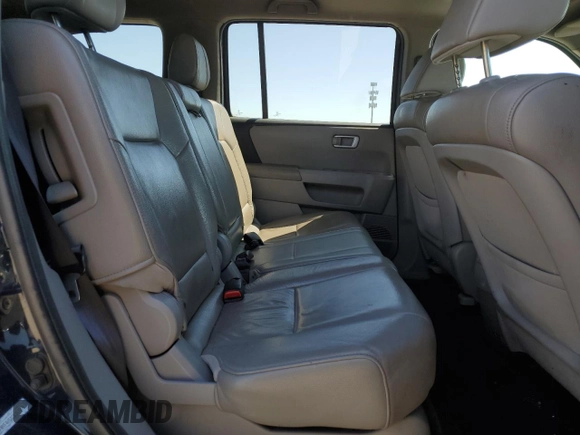 2012 Honda Pilot EX-L with VIN 5FNYF4H5XCB007889, listed as a Copart auction lot 52284075 with 318,329 mi miles and Salvage Title. Bid and sale history available at DreamBid. Image 11.