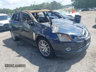 2014 Cadillac SRX Performance Collection z VIN 3GYFNCE31ES599632, wystawiony jako IAAI lot #42757876 z przebiegiem Nie podano mil oraz . Historia ofert i sprzedaży dostępna na DreamBid. Obrazek 1.