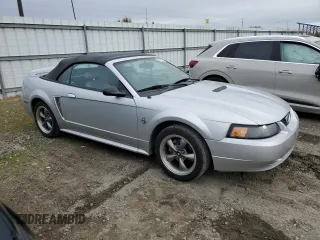 1999 Ford Mustang GT with VIN 1FAFP45X0XF234431, listed as a Copart auction lot 47402055 with 105,861 mi miles and Salvage title. Bid and sale history available at DreamBid. Image 4.