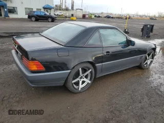 1994 Mercedes-Benz SL 5.0L with VIN WDBFA67E3RF102932, listed as a Copart auction lot 79107264 with 149,344 mi miles and Salvage title. Bid and sale history available at DreamBid. Image 3.