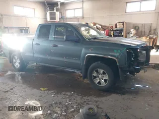2014 Chevrolet Silverado 1500 LT with VIN 1GCVKREC0EZ130211, listed as a IAAI auction lot 41601900 with 209,604 mi miles and . Bid and sale history available at DreamBid. Image 1.