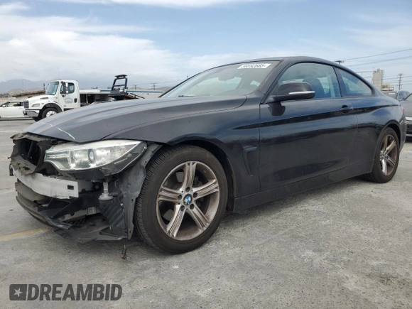 2014 BMW 4 Series 428i with VIN WBA3N7C55EF719986, listed as a Copart auction lot 56692685 with 74,377 mi miles and Salvage title. Bid and sale history available at DreamBid. Image 1.