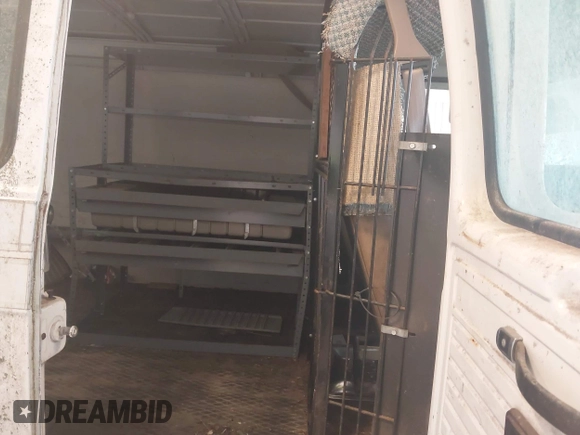 1992 Chevrolet Chevy Van z VIN 2GCEG25Z3N4144138, wystawiony jako IAAI lot #42389578 z przebiegiem 129 513 mil mil oraz . Historia ofert i sprzedaży dostępna na DreamBid. Obrazek 8.