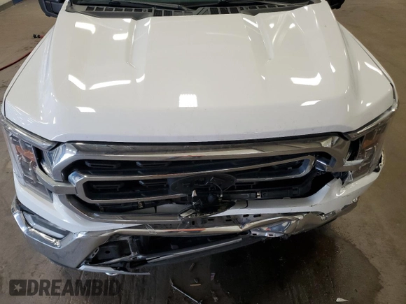 2021 Ford F-150 XL with VIN 1FTFW1E88MKE41611, listed as a Copart auction lot 61092115 with 83,277 mi miles and Salvage title. Bid and sale history available at DreamBid. Image 11.