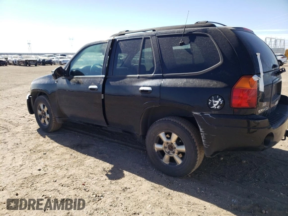 2002 GMC Envoy SLT with VIN 1GKDT13S022107749, listed as a Copart auction lot 59548544 with 221,224 mi miles and Clean Title. Bid and sale history available at DreamBid. Image 2.