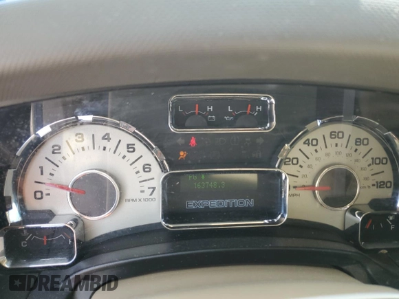 2014 Ford Expedition XLT z VIN 1FMJU1H55EEF14723, wystawiony jako Copart lot #56455855 z przebiegiem 163 748 mil mil oraz Szkoda całkowita • Salvage title. Historia ofert i sprzedaży dostępna na DreamBid. Obrazek 9.