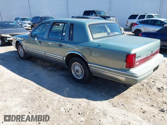 1994 Lincoln Town Car Signature z VIN 1LNLM82W4RY785151, wystawiony jako IAAI lot #41638398 z przebiegiem Nie podano mil oraz . Historia ofert i sprzedaży dostępna na DreamBid. Obrazek 3.