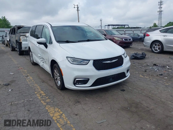 2023 Chrysler Pacifica Touring L with VIN 2C4RC1BG8PR535446, listed as a IAAI auction lot 42307923 with 65,718 mi miles and . Bid and sale history available at DreamBid. Image 1.