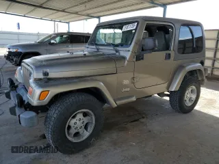 2003 Jeep Wrangler Sahara z VIN 1J4FA59S83P303347, wystawiony jako Copart lot #51811755 z przebiegiem 145 640 mil mil oraz Czysty tytuł • Clean title. Historia ofert i sprzedaży dostępna na DreamBid. Obrazek 1.