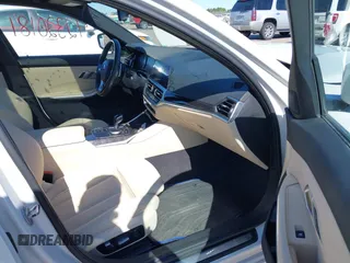 2021 BMW 3 Series 330i xDrive with VIN WBA5R7C0XMFK54525, listed as a IAAI auction lot 42320181 with 54,576 mi miles and . Bid and sale history available at DreamBid. Image 5.