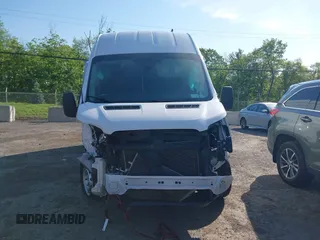2021 Ford Transit Cargo z VIN 1FTBW3X84MKA60720, wystawiony jako IAAI lot #42202665 z przebiegiem 67 295 mil mil oraz . Historia ofert i sprzedaży dostępna na DreamBid. Obrazek 13.