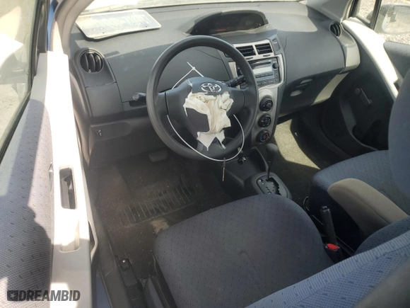 2010 Toyota Yaris with VIN JTDJT4K38A5297629, listed as a Copart auction lot 48306065 with 164,664 mi miles and Salvage Title. Bid and sale history available at carsss.com. Image 8.