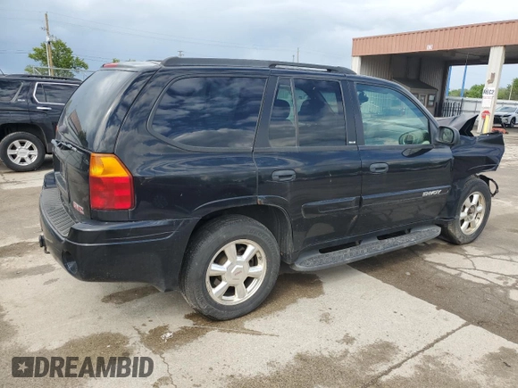 2003 GMC Envoy SLE z VIN 1GKDT13S432160651, wystawiony jako Copart lot #56938205 z przebiegiem 197 593 mil mil oraz Szkoda całkowita • Salvage title. Historia ofert i sprzedaży dostępna na DreamBid. Obrazek 3.