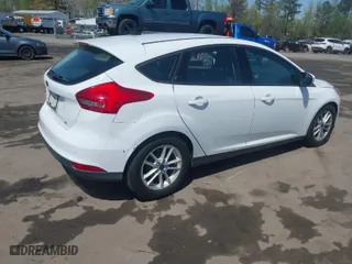 2015 Ford Focus SE with VIN 1FADP3K21FL246601, listed as a IAAI auction lot 41985398 with 139,782 mi miles. Bid and sale history available at carsss.com. Image 4.