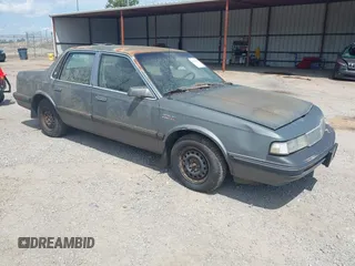 1989 Oldsmobile Cutlass Ciera with VIN 2G3AJ51NXK2439345, listed as a IAAI auction lot 42128301 with 241,434 mi miles and . Bid and sale history available at DreamBid. Image 1.