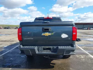 2015 Chevrolet Colorado 4WD LT with VIN 1GCGTBE37F1208139, listed as a IAAI auction lot 41589530 with 105,806 mi miles. Bid and sale history available at carsss.com. Image 16.