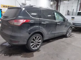 2014 Ford Escape SE with VIN 1FMCU9GXXEUD09124, listed as a IAAI auction lot 41747925 with 147,996 mi miles and . Bid and sale history available at DreamBid. Image 4.