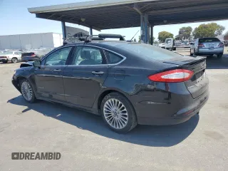 2014 Ford Fusion Titanium Hybrid with VIN 3FA6P0RUXER363916, listed as a Copart auction lot 62224315 with 126,308 mi miles and Salvage title. Bid and sale history available at DreamBid. Image 2.