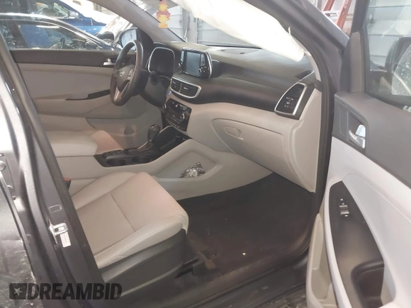 2019 Hyundai Tucson Ultimate with VIN KM8J3CAL0KU063161, listed as a IAAI auction lot 41606894 with 56,037 mi miles. Bid and sale history available at carsss.com. Image 5.
