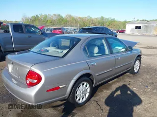 2000 Nissan Maxima GXE z VIN JN1CA31D5YT501086, wystawiony jako IAAI lot #41982095 z przebiegiem 184 012 mil mil oraz . Historia ofert i sprzedaży dostępna na DreamBid. Obrazek 4.