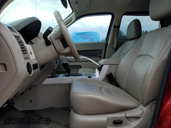 2009 Mercury Mariner с VIN 4M2CU91G89KJ19945, выставлен на аукционе Copart как лот 81745154 с пробегом 128 618 миль миль и Списание • Salvage title. История ставок и продаж доступна на DreamBid. Изображение 7.