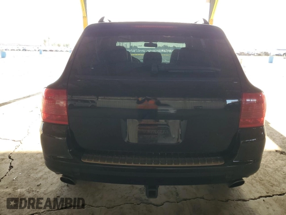 2006 Porsche Cayenne S with VIN WP1AB29P56LA66639, listed as a Copart auction lot 52097595 with 180,827 mi miles and Salvage title. Bid and sale history available at DreamBid. Image 6.