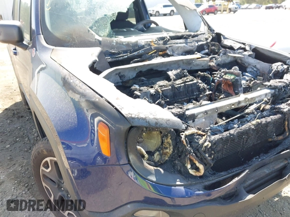 2017 Jeep Renegade Deserthawk z VIN ZACCJBCBXHPE70318, wystawiony jako IAAI lot #41922391 z przebiegiem Nie podano mil oraz . Historia ofert i sprzedaży dostępna na DreamBid. Obrazek 14.