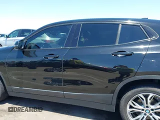 2018 BMW X2 sDrive28i with VIN WBXYJ3C35JEJ82700, listed as a IAAI auction lot 42675146 with 84,961 mi miles and . Bid and sale history available at DreamBid. Image 15.