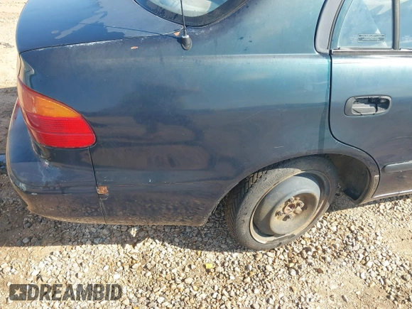 1998 Chevrolet Prizm Lsi z VIN 1Y1SK5281WZ425892, wystawiony jako IAAI lot #42250732 z przebiegiem Nie podano mil oraz . Historia ofert i sprzedaży dostępna na DreamBid. Obrazek 6.