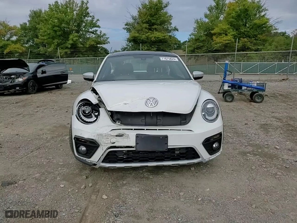 2018 Volkswagen Beetle Dune with VIN 3VWSD7AT1JM706856, listed as a Copart auction lot 71675824 with 119,451 mi miles and Salvage Title. Bid and sale history available at carsss.com. Image 11.
