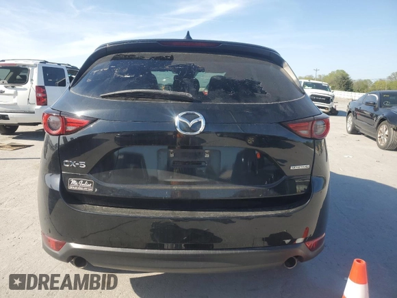 2021 Mazda CX-5 Grand Touring with VIN JM3KFADM2M0390669, listed as a Copart auction lot 53540805 with 150,092 mi miles and Clean Title. Bid and sale history available at carsss.com. Image 6.