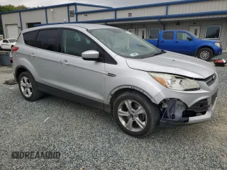 2014 Ford Escape SE with VIN 1FMCU0G94EUB33779, listed as a Copart auction lot 50709855 with 245,918 mi miles and Salvage Title. Bid and sale history available at carsss.com. Image 4.