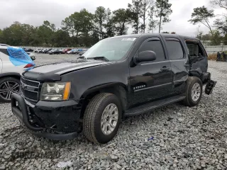 2009 Chevrolet Tahoe Police with VIN 1GNEC03009R145015, listed as a Copart auction lot 80051704 with 163,224 mi miles and Salvage title. Bid and sale history available at DreamBid. Image 1.