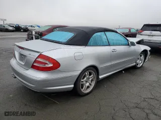 2004 Mercedes-Benz CLK-Class 5.5L AMG with VIN WDBTK76G44T021103, listed as a Copart auction lot 84726784 with 77,565 mi miles and Salvage Title. Bid and sale history available at carsss.com. Image 3.