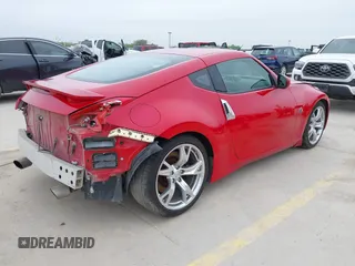 2009 Nissan 370Z Touring z VIN JN1AZ44E79M404171, wystawiony jako IAAI lot #41924058 z przebiegiem 75 940 mil mil oraz . Historia ofert i sprzedaży dostępna na DreamBid. Obrazek 4.
