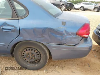 2004 Ford Taurus LX z VIN 1FAFP52U64A114884, wystawiony jako IAAI lot #42212573 z przebiegiem 106 402 mil mil oraz . Historia ofert i sprzedaży dostępna na DreamBid. Obrazek 6.