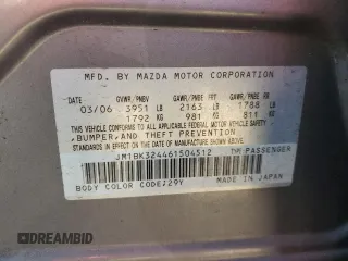 2006 Mazda 3 s with VIN JM1BK324461504512, listed as a Copart auction lot 80015434 with 130,797 mi miles and Salvage Title. Bid and sale history available at DreamBid. Image 12.