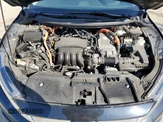 2018 Honda Clarity Touring z VIN JHMZC5F37JC007376, wystawiony jako Copart lot #52385225 z przebiegiem 64 062 mil mil oraz Szkoda całkowita • Salvage title. Historia ofert i sprzedaży dostępna na DreamBid. Obrazek 13.
