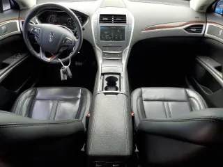 2014 Lincoln MKZ z VIN 3LN6L2JKXER833675, wystawiony jako Copart lot #53023885 z przebiegiem 105 843 mil mil oraz Szkody całkowita. Historia ofert i sprzedaży dostępna na DreamBid. Obrazek 8.