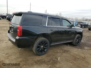 2016 Chevrolet Tahoe LTZ with VIN 1GNSKCKC1GR169159, listed as a Copart auction lot 49651945 with 156,166 mi miles and Salvage Title. Bid and sale history available at carsss.com. Image 3.
