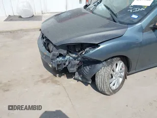 2012 Mazda 3 i Touring with VIN JM1BL1V77C1611119, listed as a IAAI auction lot 42177506 with 91,970 mi miles and . Bid and sale history available at DreamBid. Image 6.