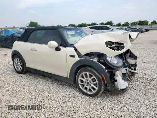 2017 MINI Convertible Cooper z VIN WMWWG5C32H3C20341, wystawiony jako Copart lot #57039685 z przebiegiem 100 575 mil mil oraz Szkoda całkowita • Salvage title. Historia ofert i sprzedaży dostępna na DreamBid. Obrazek 4.