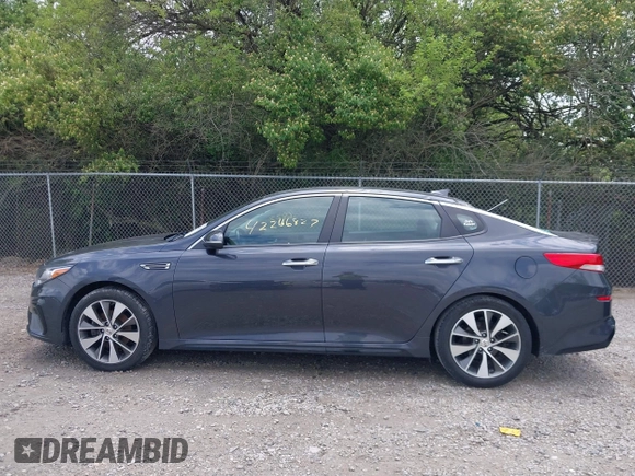 2019 Kia Optima LX z VIN 5XXGT4L32KG298796, wystawiony jako IAAI lot #42266827 z przebiegiem 89 841 mil mil oraz . Historia ofert i sprzedaży dostępna na DreamBid. Obrazek 14.