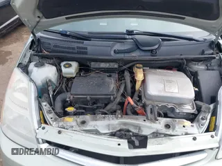 2006 Toyota Prius z VIN JTDKB20U963131145, wystawiony jako IAAI lot #41857847 z przebiegiem 113 251 mil mil oraz . Historia ofert i sprzedaży dostępna na DreamBid. Obrazek 10.