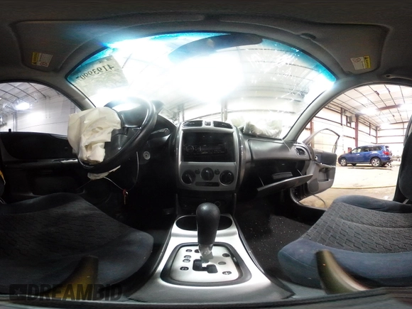 2003 Mazda Protege DX with VIN JM1BJ226431112902, listed as a IAAI auction lot 41939907 with 184,618 mi miles and . Bid and sale history available at DreamBid. Image 24.