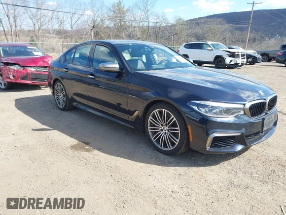 2018 BMW 5 Series M550i xDrive with VIN WBAJB9C52JB035930, listed as a IAAI auction lot 41674415 with 56,294 mi miles and . Bid and sale history available at DreamBid. Image 1.