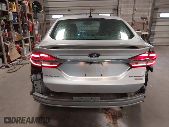 2018 Ford Fusion Titanium with VIN 3FA6P0D91JR138698, listed as a IAAI auction lot 41992522 with 95,017 mi miles and . Bid and sale history available at DreamBid. Image 17.